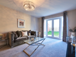 Spacious living room with patio doors to the rear garden