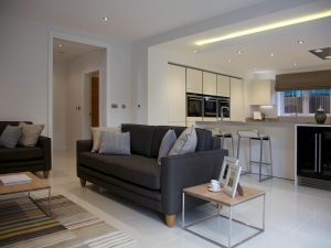 Living area adjacent to kitchen / dining area.