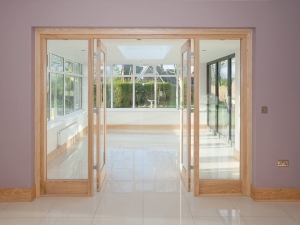 Doors leading into large sun room.
