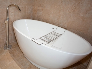 Modern bath in wetroom at Anderson House, Halifax